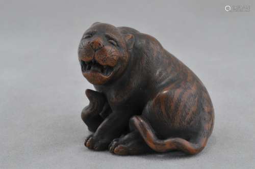 Carved wooden Netsuke. Japan. 19th century. Study of a