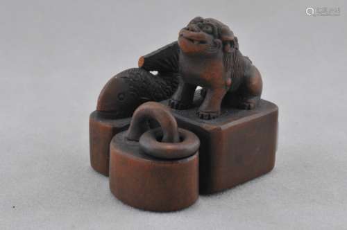 Carved wooden Netsuke. Japan. 19th C. Three Seals.