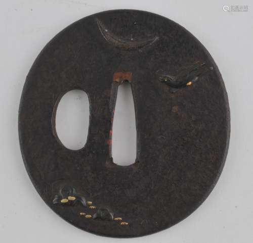 Handguard. Japan. 18th century. Iron with mixed metal