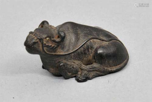 Carved wooden Netsuke. Japan. 19th century. Ox with