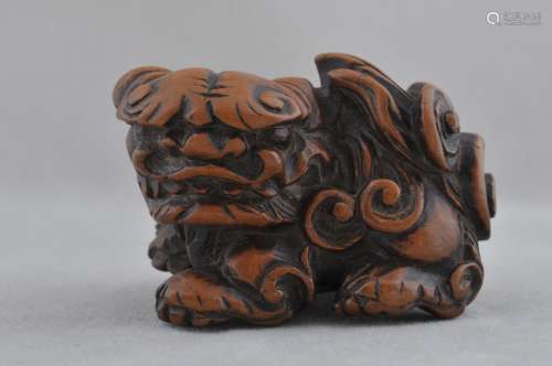 Wooden Netsuke. Japan. 19th C. Carving of a Shishi.