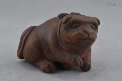 Carved wooden Netsuke. Japan. 19th century. Study of a