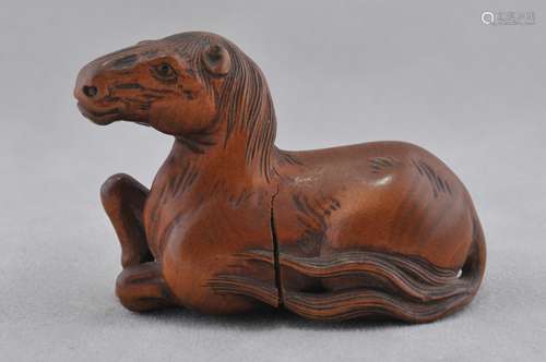 Carved wooden Netsuke. Japan. 19th century. Study of a