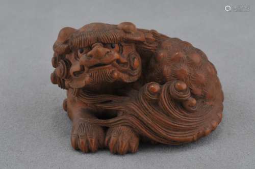 Carved wooden Netsuke. Japan. 19th C. Carving of Shishi