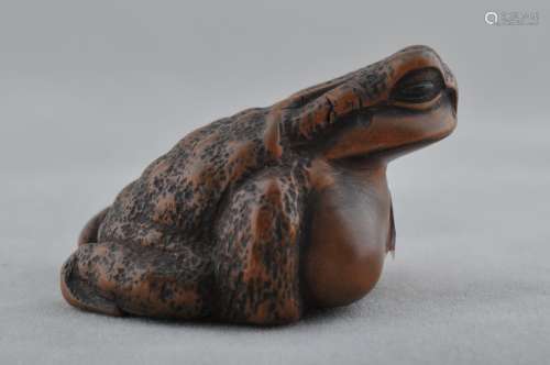 Wooden Netsuke. Japan. 19th century. Study of a frog.