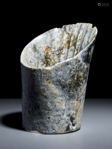 A REMARKABLE NEOLITHIC HOOF-SHAPED (TIXING) SLANTED TUBE IN STRONGLY WEATHERED JADE