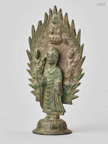 BUDDHA STANDING IN FRONT OF A FLAMING HALO, BRONZE, CHINA, DATED 571