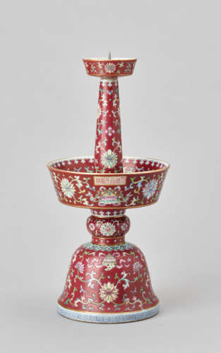 A CORAL-GROUND 'EIGHT BUDDHIST EMBLEMS' CANDLESTICK, SEAL MARK AND PERIOD OF DAOGUANG