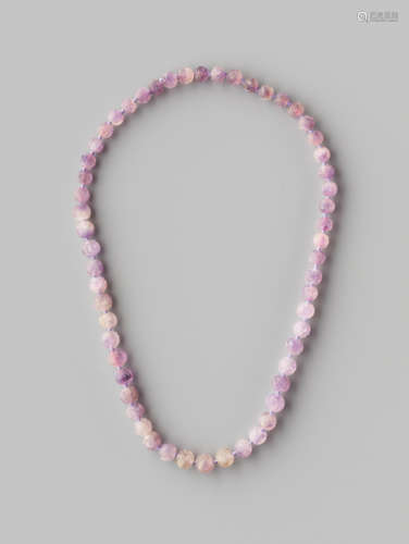 AN AMETHYST BEAD ‘SHOU’ NECKLACE, 56 BEADS, QING DYNASTY