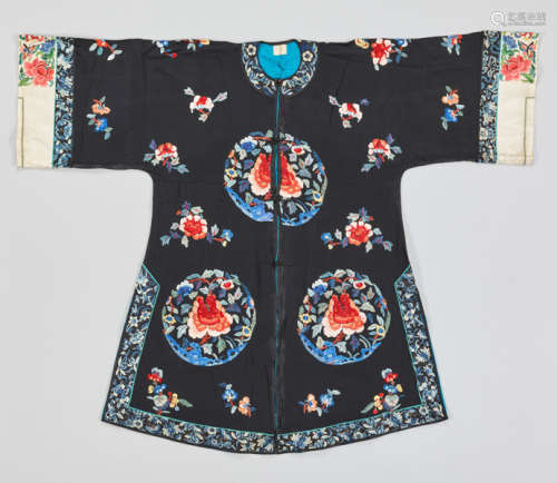 A BLACK SILK LADY’S ROBE WITH PEONY ROUNDELS, 1920s