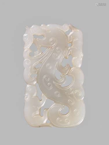 A CELADON-WHITE JADE ‘DRAGON AND TAPIR’ PENDANT, QING DYNASTY