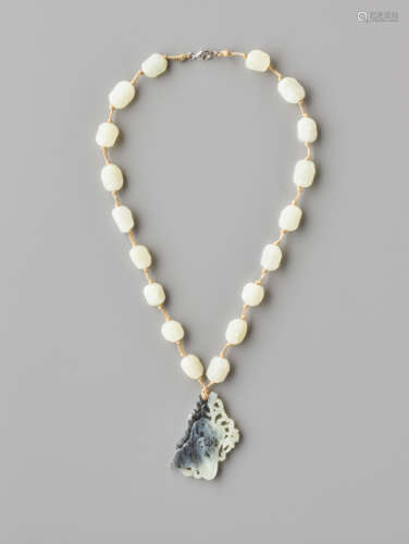 A WHITE JADE 'EIGHTTEEN ARHATS' ROSARY, QING DYNASTY