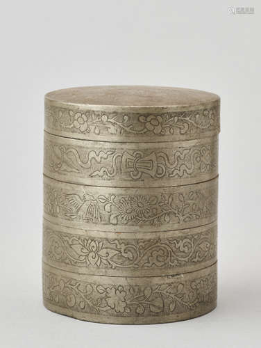 AN ENGRAVED FIVE-STORY PEWTER COSMETICS BOX, QING DYNASTY