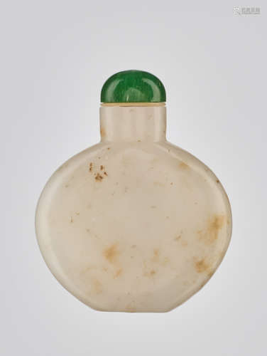 A PLAIN WHITE AND RUSSET CALCITE BOTTLE, 1780-1860