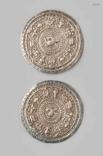 A PAIR OF BUDDHIST SILVER REPOUSSÉ EMBLEMS, QING DYNASTY