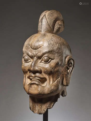 OVER-LIFESIZE LIMESTONE HEAD OF A TIANWANG GUARDIAN GOD, CHINA, TANG DYNASTY