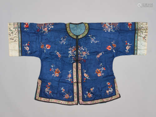 A BLUE SILK WAITAO LADY’S JACKET WITH FLORAL EMBROIDERY, REPUBLICAN PERIOD