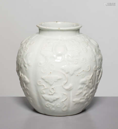 AN OVOID ‘QINGBAI’ VASE WITH MOLDED DECORATION, QING DYNASTY