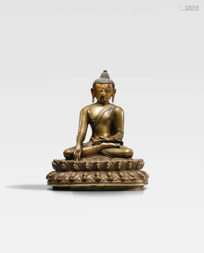 西藏，约十三世纪 错银错红铜释迦牟尼铜像