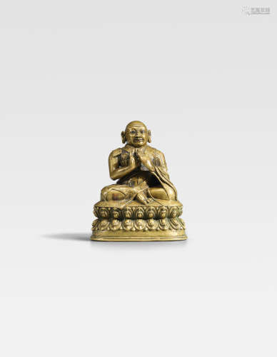 西藏，约十五世纪 错银错红铜喇嘛铜像