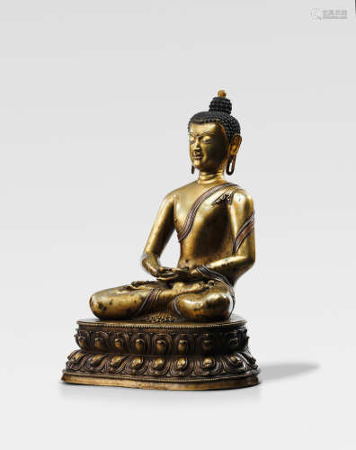 西藏，约十三世纪 错银错红铜释迦牟尼铜像
