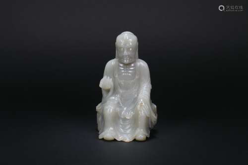 A Chinese Carved Jade Figure Of Luohan
