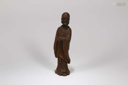 A Chinese Carved Wood Figure of Buddha