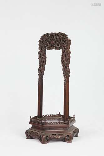 A Chinese Carved Hardwood Cloth Stand