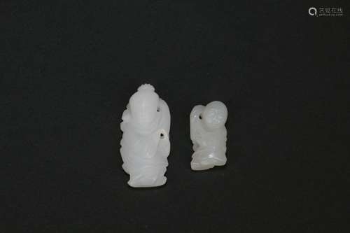 A Set Of Two Chinese Carved Jade Pendants