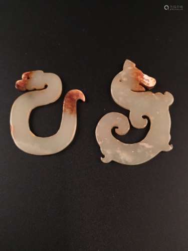 Pair of Han Dynasty Dragon Pendants