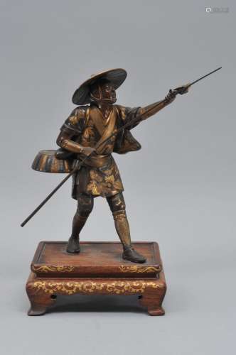 Bronze figure. Japan. Meiji period. (1868-1912). Mixed metal work. Miya-O style. Bird catcher. Lacquered wood base. 10-1/2