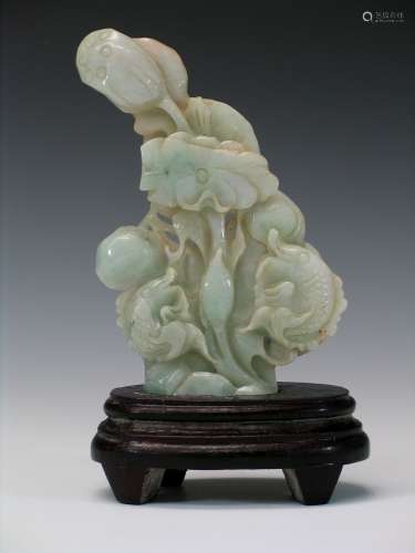 Chinese jade carving with wood stand.