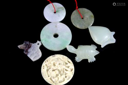 Group of jade and jadeite pendants.