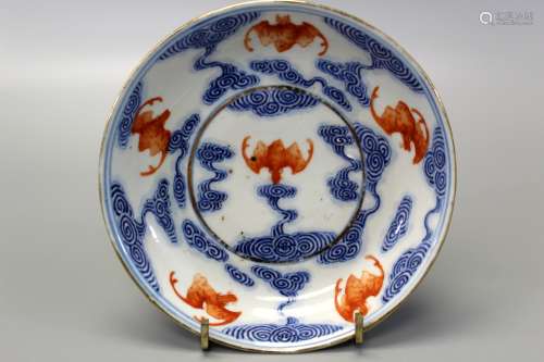 Chinese blue and white and iron red porcelain dish with bat decoration, Guangxu mark and of the period.