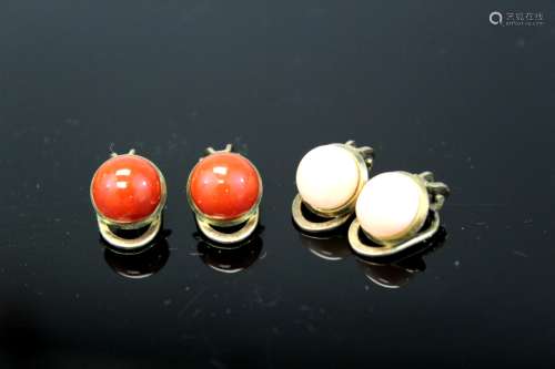 Two pairs of coral ear studs