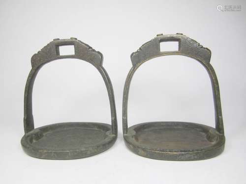 PAIR OF BRONZE STIRRUPS WITH DRAGON DECORATION