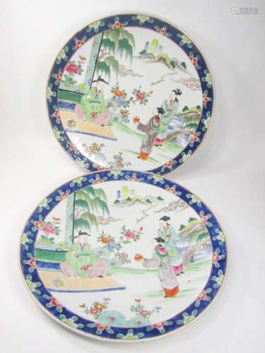 PAIR OF CHINESE FAMILLE ROSE CHARGERS