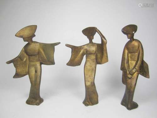 THREE GILT BRASS DANCE FIGURINES