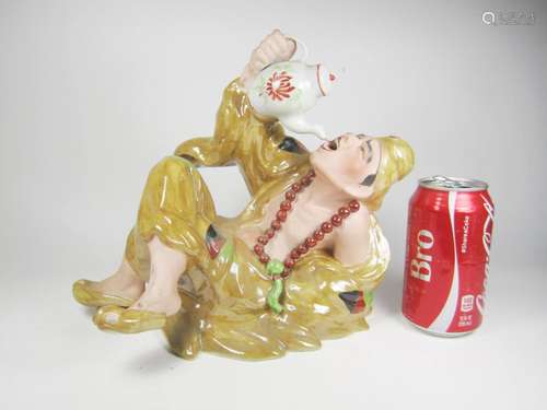 A VINTAGE CHINESE PORCELAIN JI GONG FIGURINE