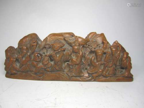 A CHINESE BOXWOOD CARVING OF EIGHT IMMORTALS