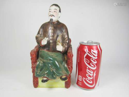 A CHINESE PORCELAIN FIGURINE