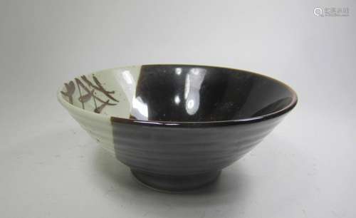 A JAPANESE BLACK/WHITE PORCELAIN BOWL