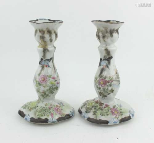 PAIR OF FAMILLE ROSE CANDLE HOLDERS