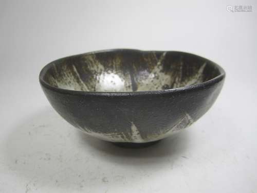 AN ASIAN POTTERY BOWL