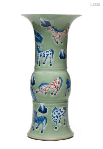 Kangxi period AN UNDERGLAZE BLUE AND RED CELADON GROUND BEAKER VASE