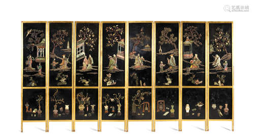 19th century AN EIGHT-PANEL JADE AND HARDSTONE INLAID BLACK LACQUER SCREEN