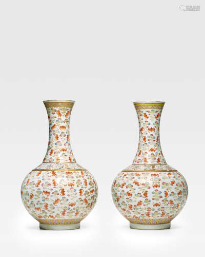 Guangxu marks and of the period A PAIR OF FAMILLE-ROSE AND IRON-RED 'ONE HUNDRED BATS' VASES