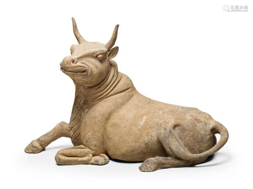 Early Tang dynasty A GRAY POTTERY FIGURE OF AN OX