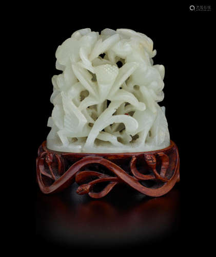 Yuan/Ming dynasty A RETICULATED CELADON JADE 'EGRETS AND LOTUS' FINIAL