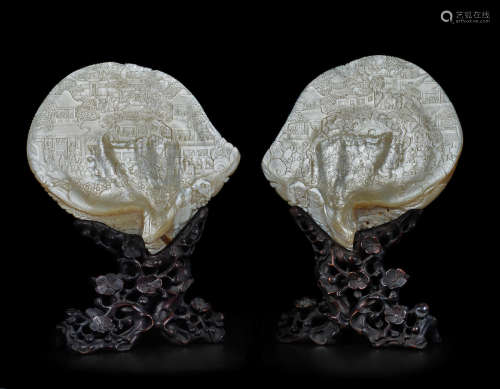 19th century A PAIR OF CARVED MOLLUSC INNER-SHELL MOTHER-OF-PEARL PLAQUES